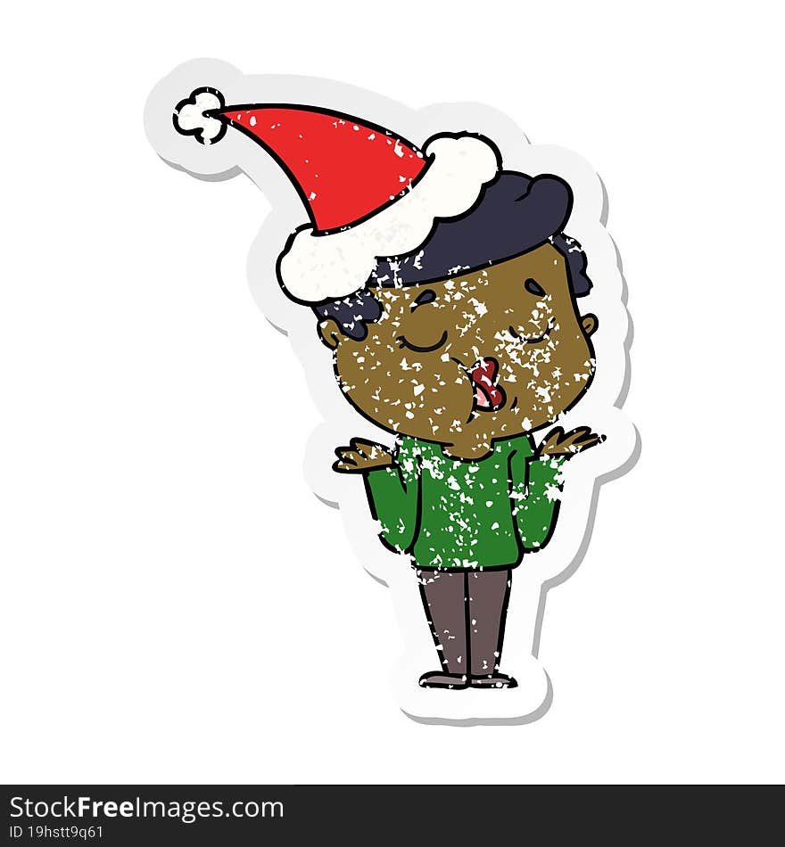 hand drawn distressed sticker cartoon of a man talking and shrugging shoulders wearing santa hat