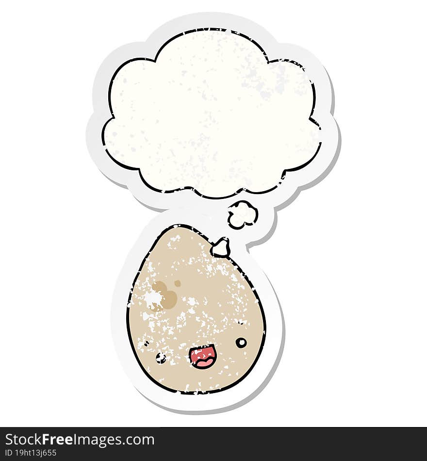 cartoon egg and thought bubble as a distressed worn sticker