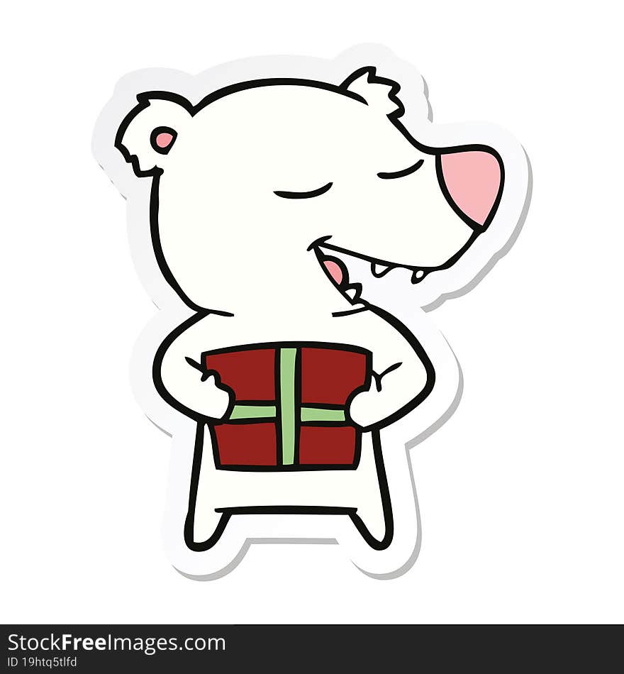 sticker of a cartoon polar bear with present