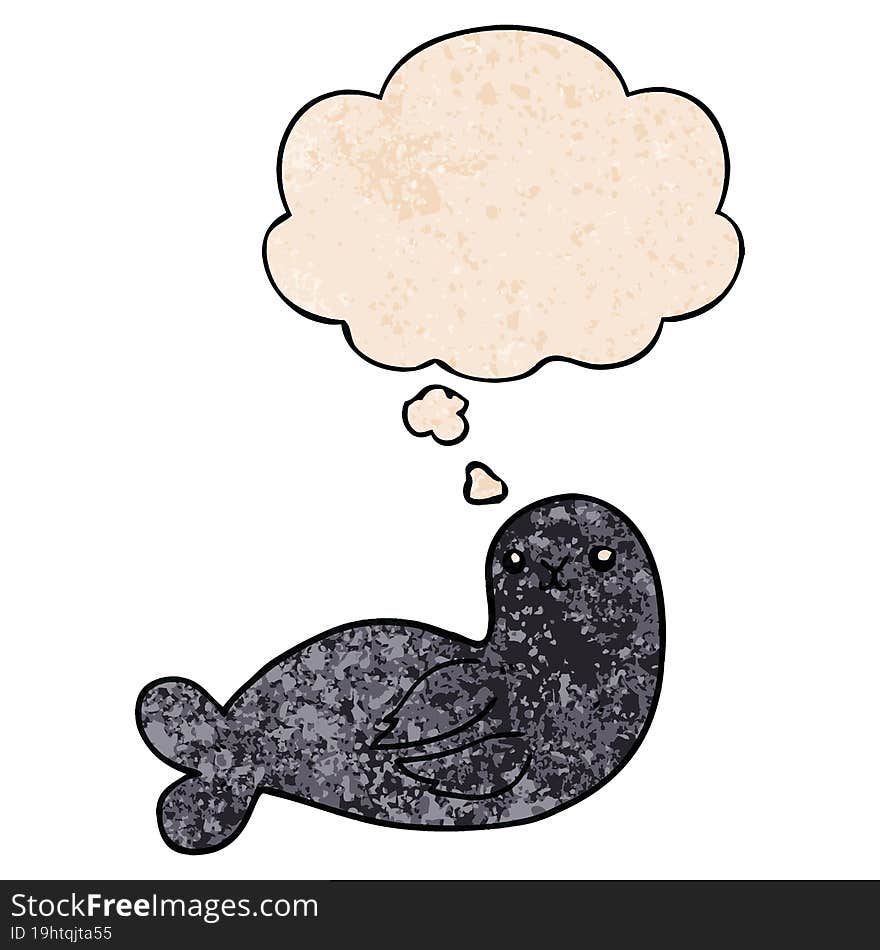 cartoon seal and thought bubble in grunge texture pattern style