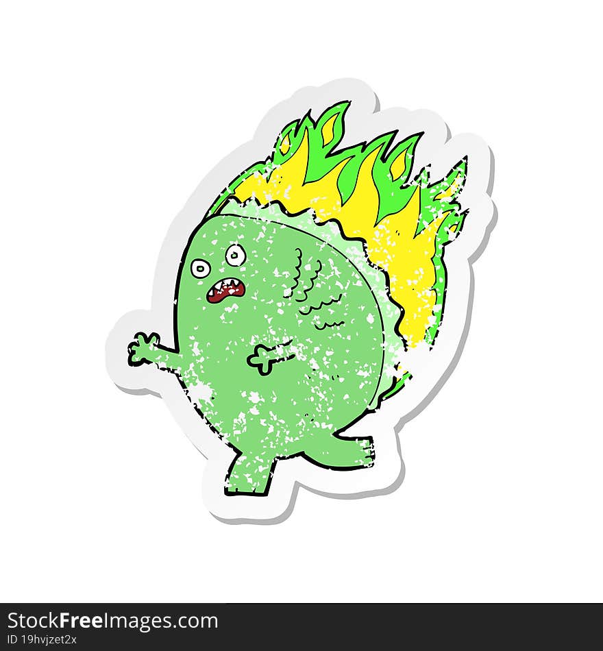 retro distressed sticker of a cartoon monster on fire