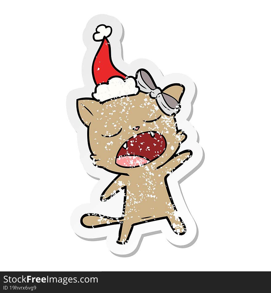 distressed sticker cartoon of a singing cat wearing santa hat