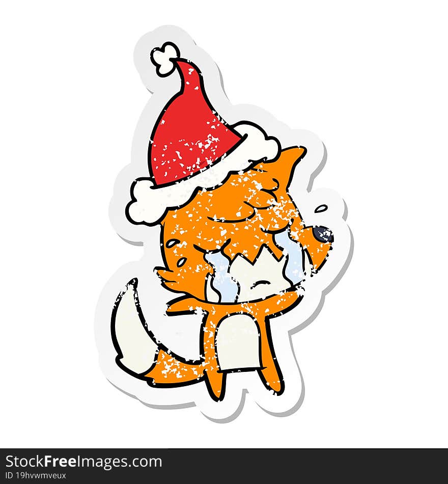 crying fox distressed sticker cartoon of a wearing santa hat