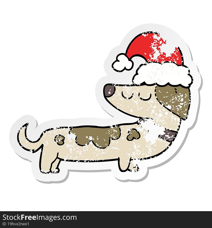 distressed sticker of a cartoon dog wearing christmas hat