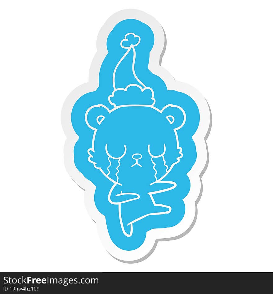 crying polar bear cartoon  sticker of a wearing santa hat