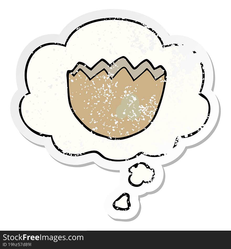 cartoon cracked eggshell with thought bubble as a distressed worn sticker