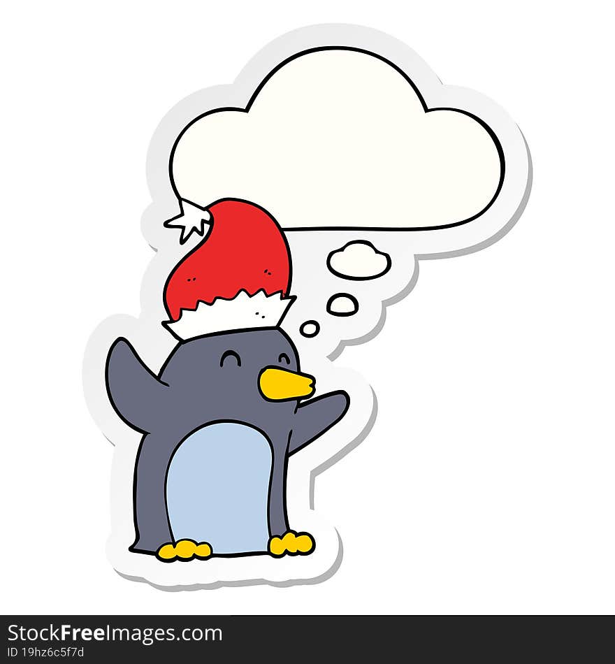 cute cartoon christmas penguin and thought bubble as a printed sticker