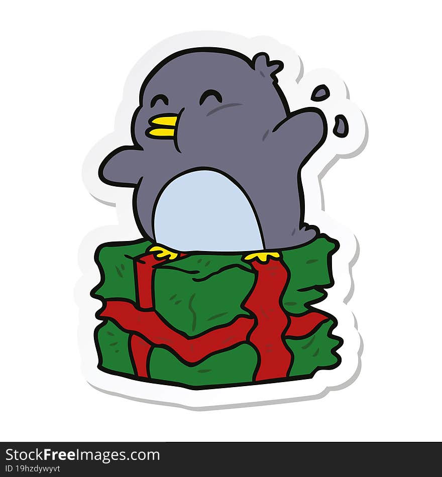 sticker of a cartoon penguin on present