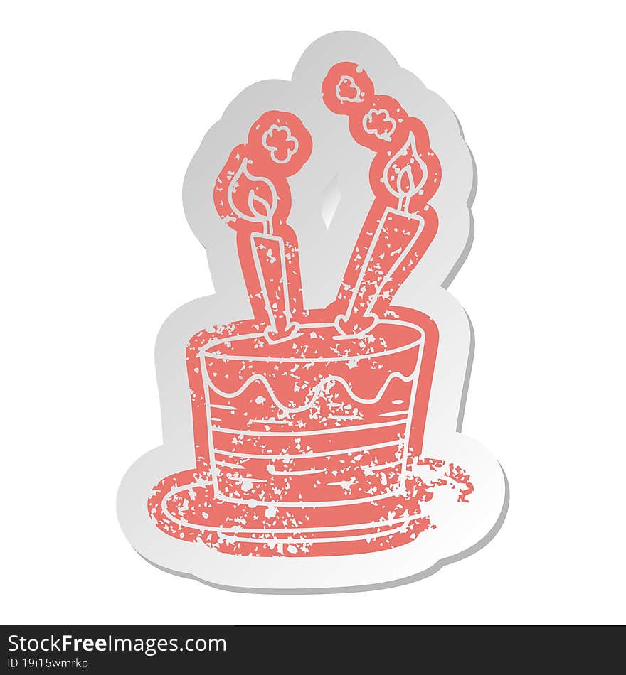 distressed old sticker of a birthday cake