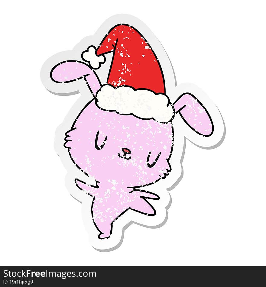 christmas distressed sticker cartoon of kawaii rabbit