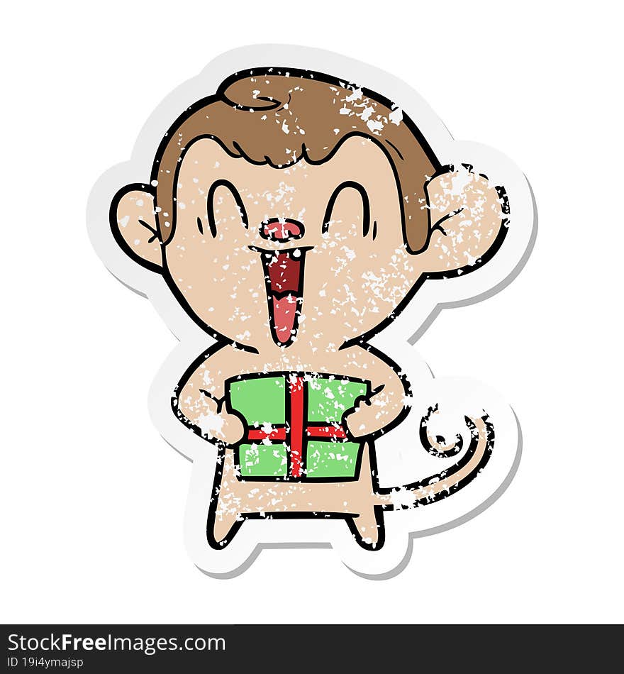 distressed sticker of a cartoon laughing monkey