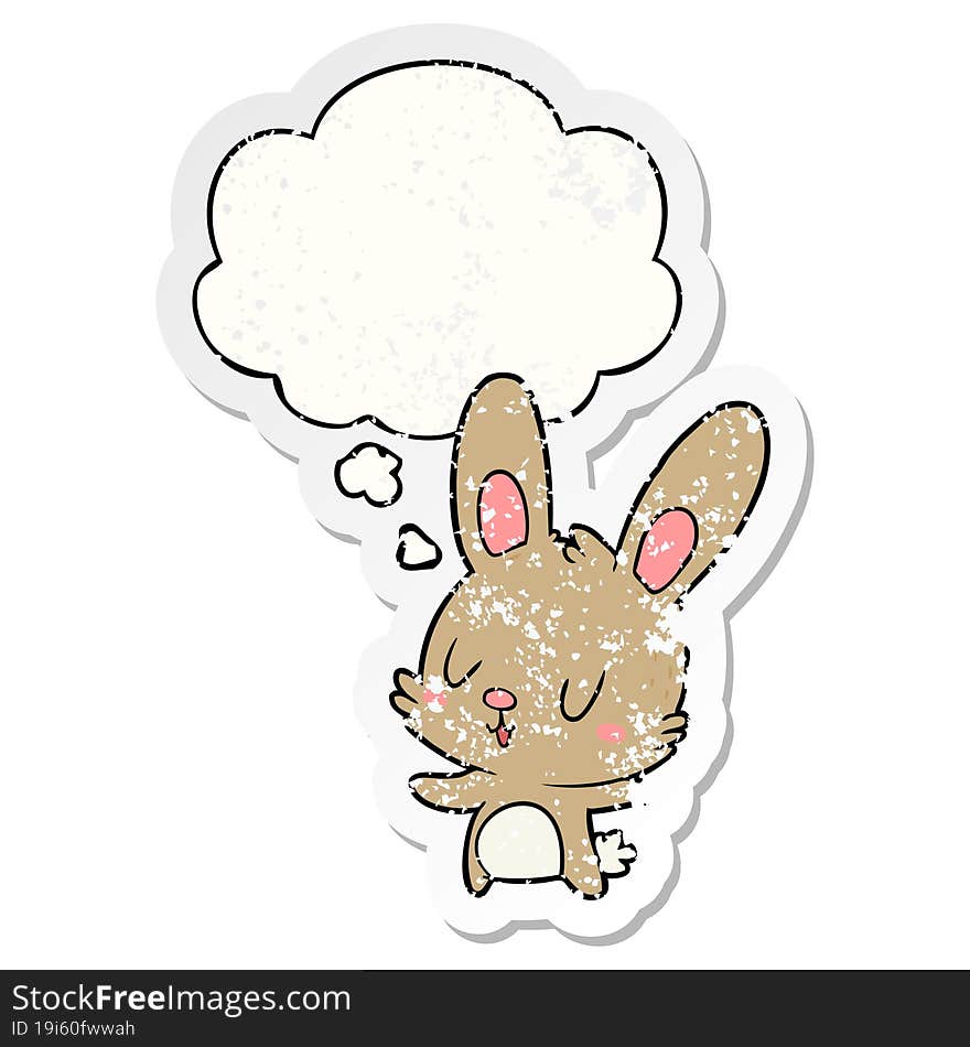 cute cartoon rabbit with thought bubble as a distressed worn sticker