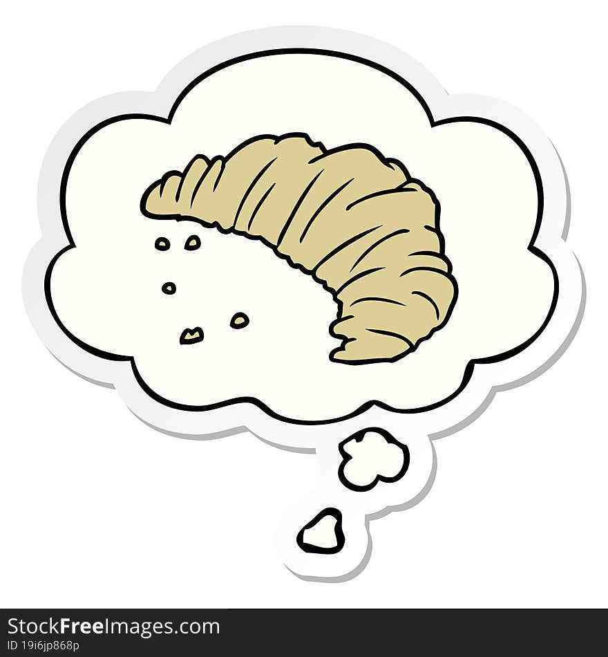 cartoon croissant and thought bubble as a printed sticker