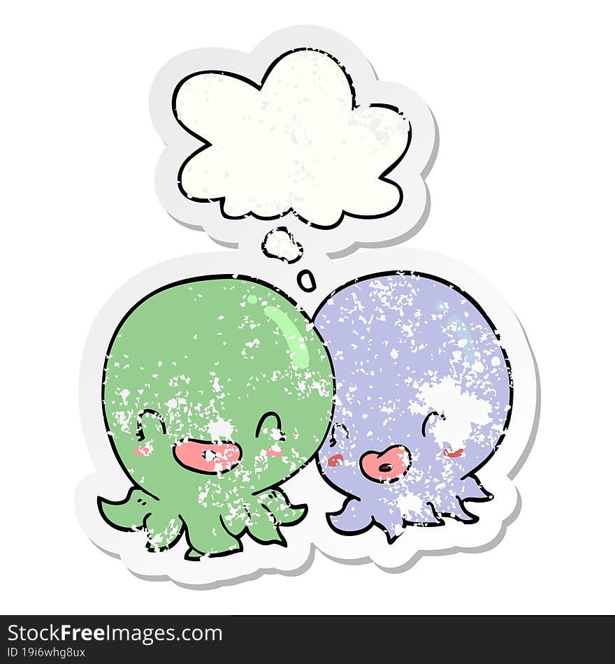 two cartoon octopi  and thought bubble as a distressed worn sticker