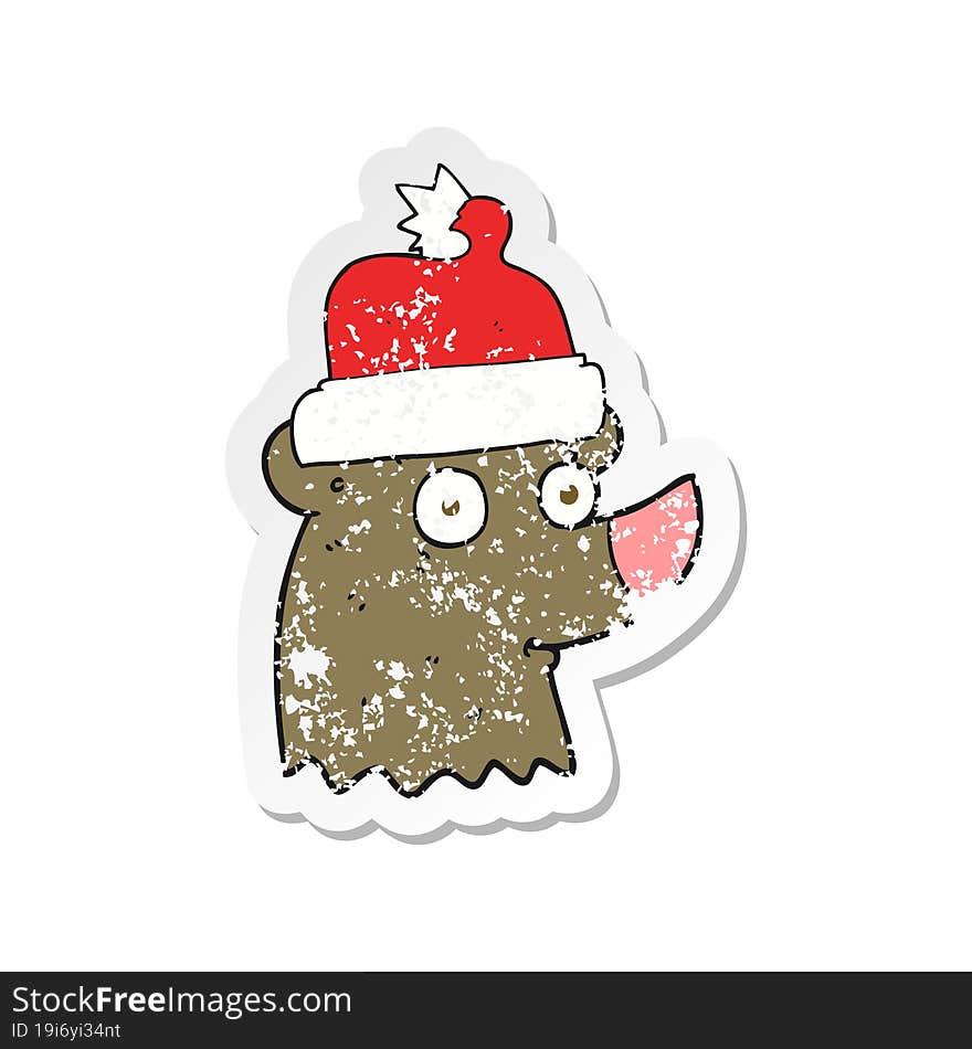 retro distressed sticker of a cartoon bear wearing christmas hat