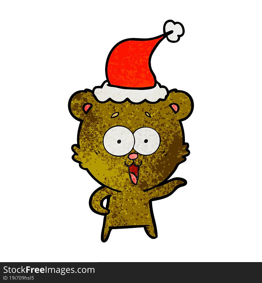 laughing teddy  bear hand drawn textured cartoon of a wearing santa hat. laughing teddy  bear hand drawn textured cartoon of a wearing santa hat