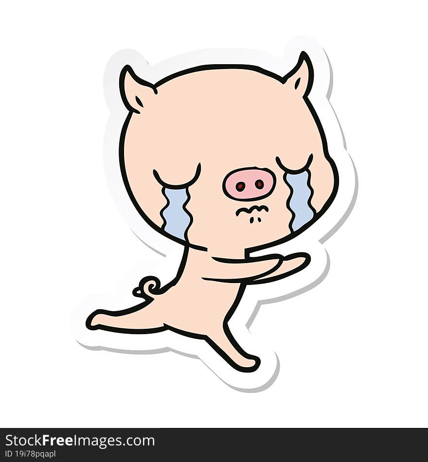 sticker of a cartoon pig crying