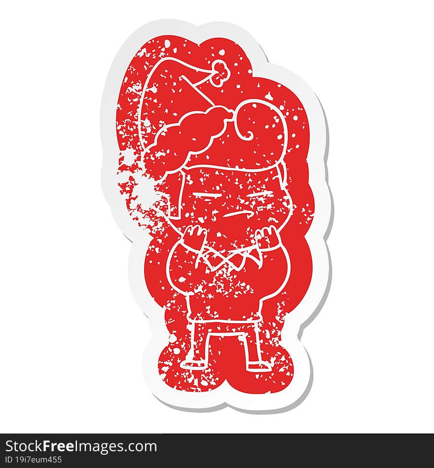 Cartoon Distressed Sticker Of A Cool Guy With Fashion Hair Cut Wearing Santa Hat