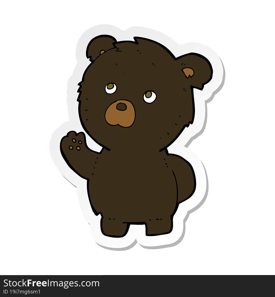 sticker of a cartoon waving black bear