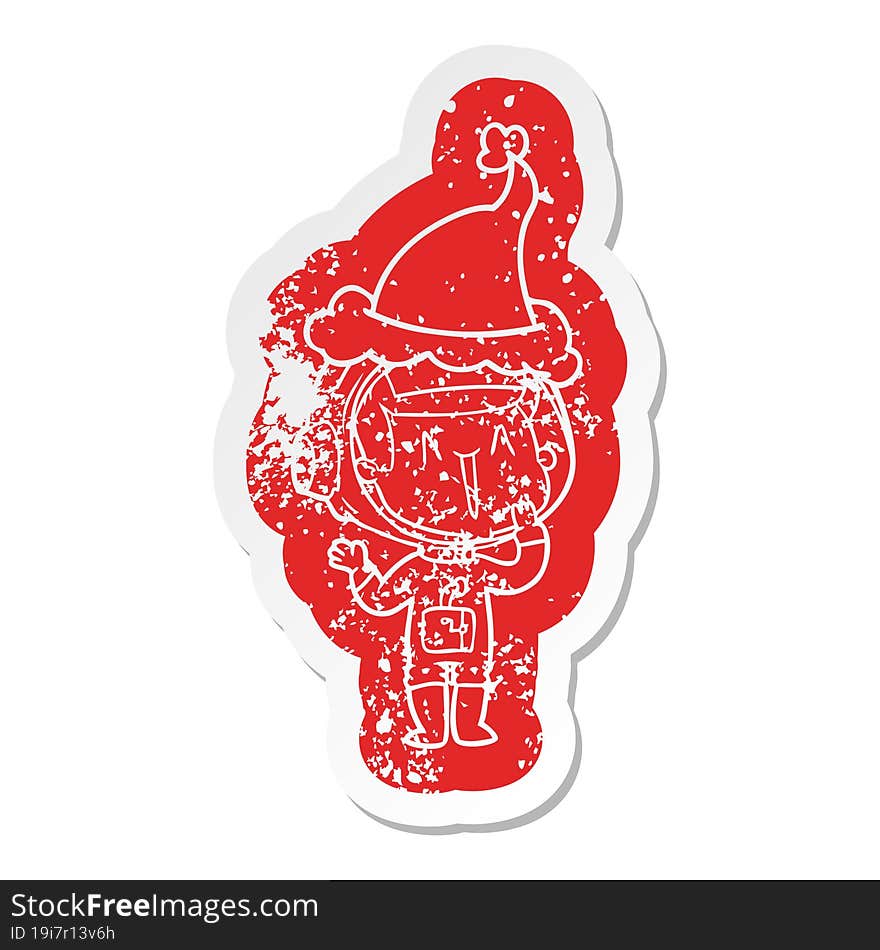 Laughing Cartoon Distressed Sticker Of A Astronaut Wearing Santa Hat