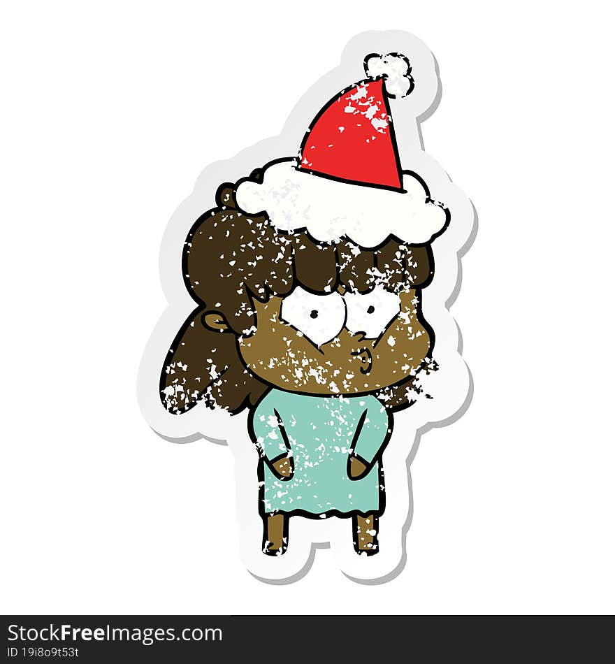 distressed sticker cartoon of a whistling girl wearing santa hat