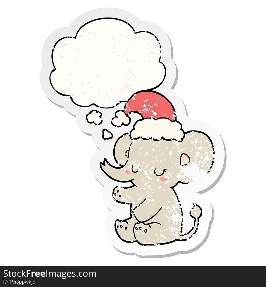 cute christmas elephant and thought bubble as a distressed worn sticker