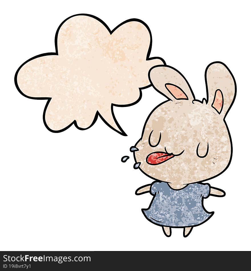 cute cartoon rabbit blowing raspberry with speech bubble in retro texture style