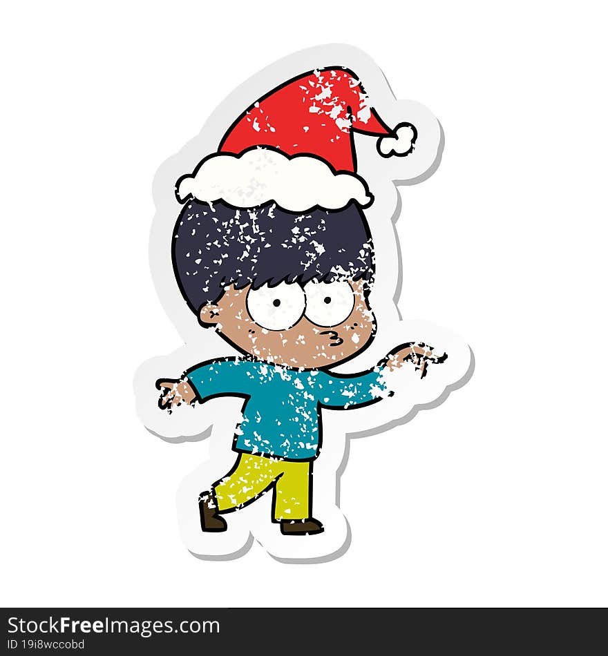 nervous distressed sticker cartoon of a boy wearing santa hat