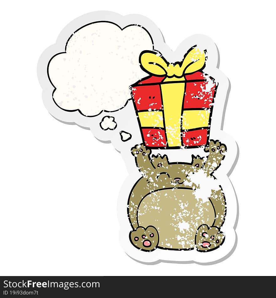 cute cartoon christmas bear and thought bubble as a distressed worn sticker