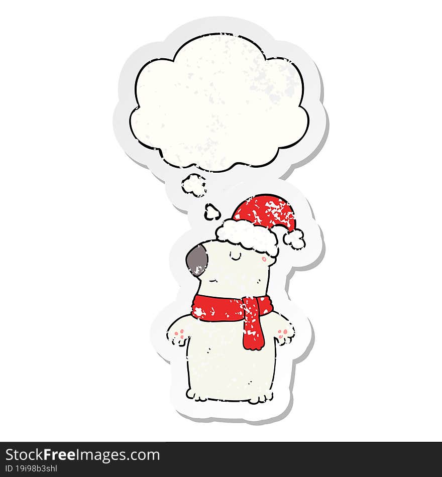 cute cartoon christmas bear and thought bubble as a distressed worn sticker