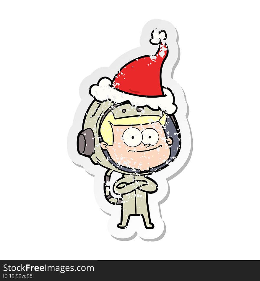 Happy Astronaut Distressed Sticker Cartoon Of A Wearing Santa Hat