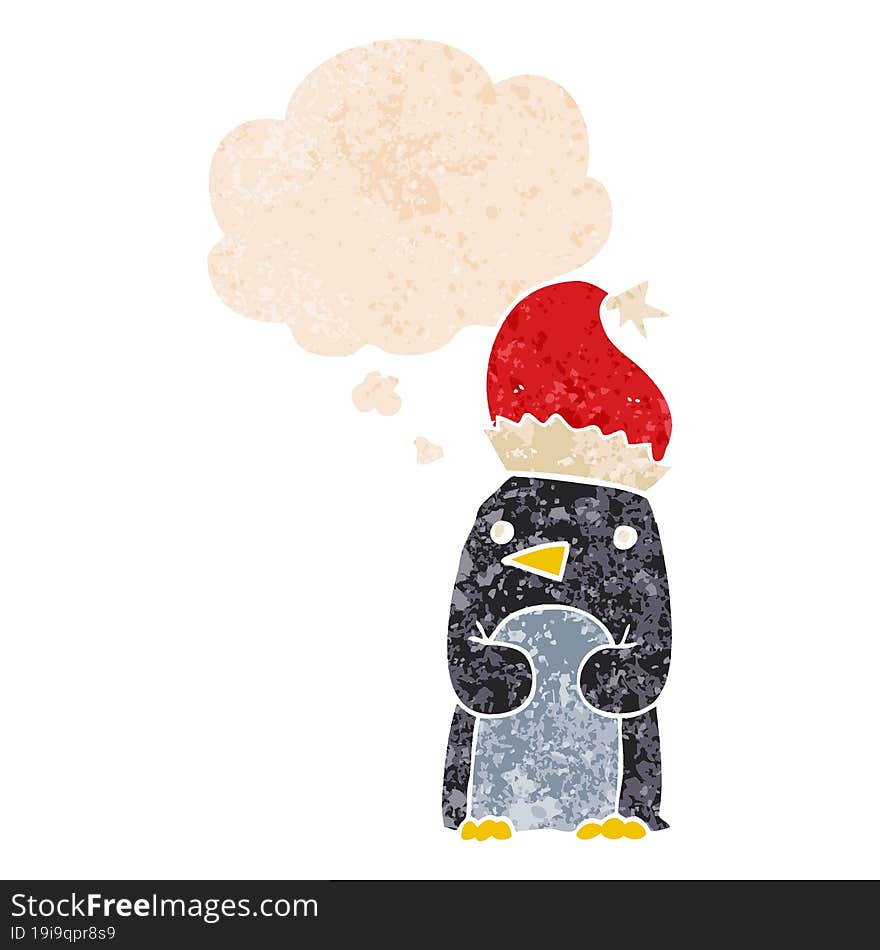 cute christmas penguin and thought bubble in retro textured style