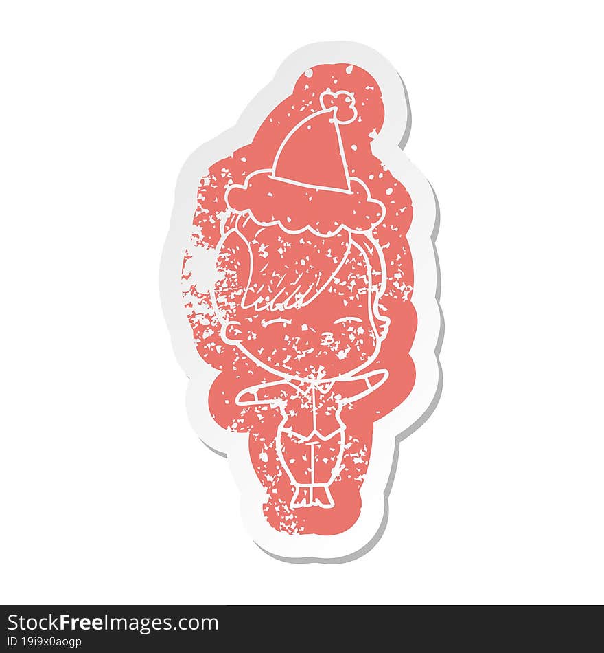 Cartoon Distressed Sticker Of A Squinting Girl Wearing Santa Hat