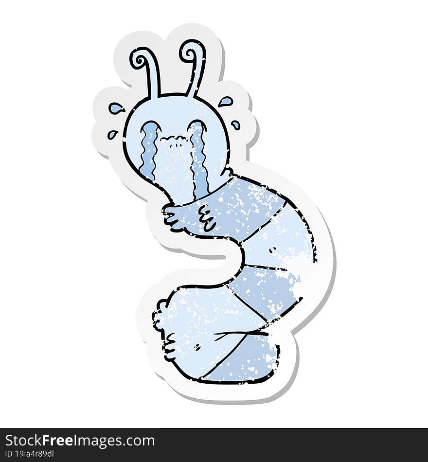 Distressed Sticker Of A Cartoon Crying Caterpillar