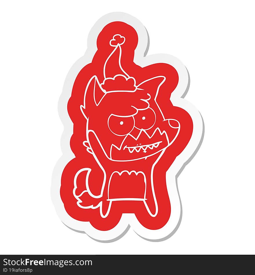 cartoon  sticker of a grinning fox wearing santa hat