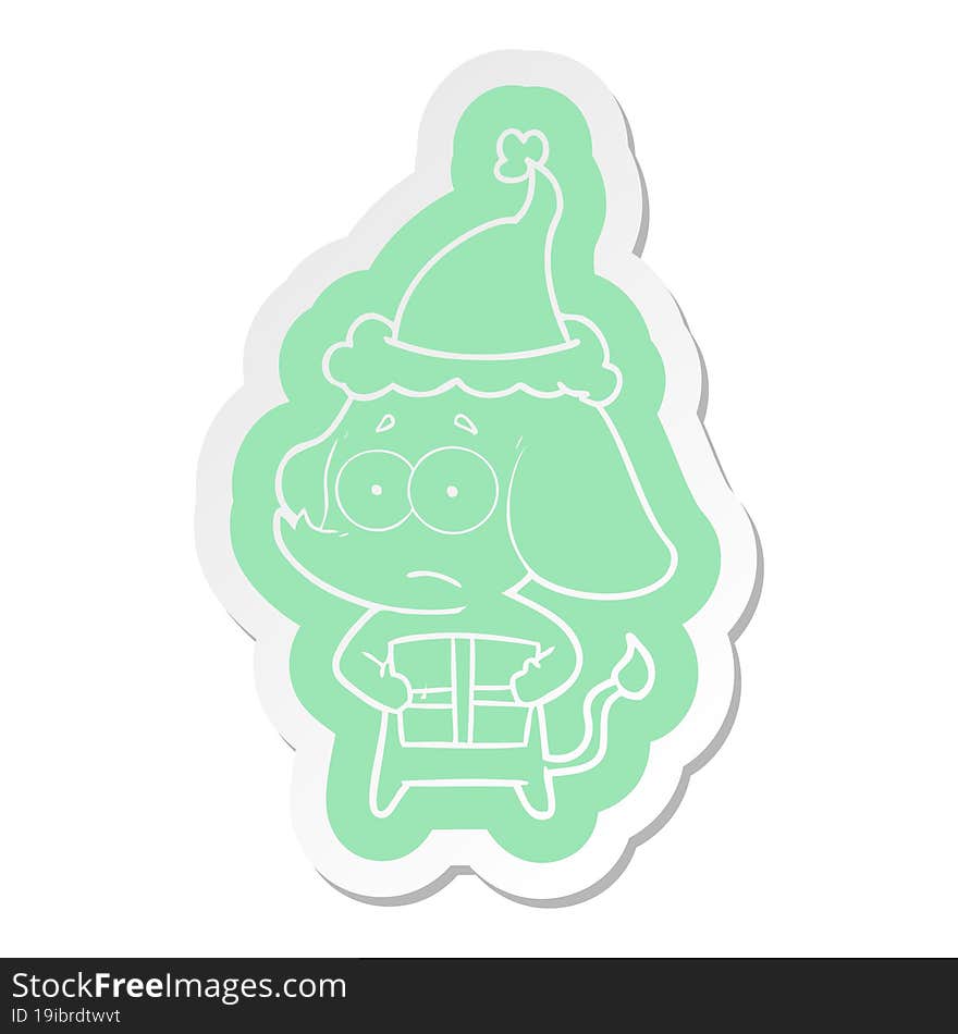 cartoon  sticker of a unsure elephant with christmas present wearing santa hat