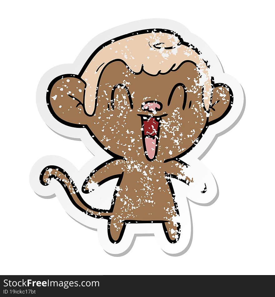 distressed sticker of a cartoon laughing monkey