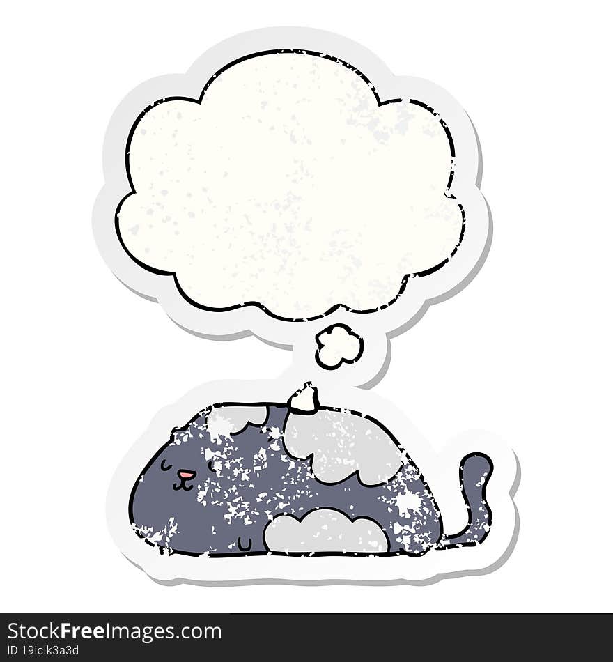 cartoon cat and thought bubble as a distressed worn sticker