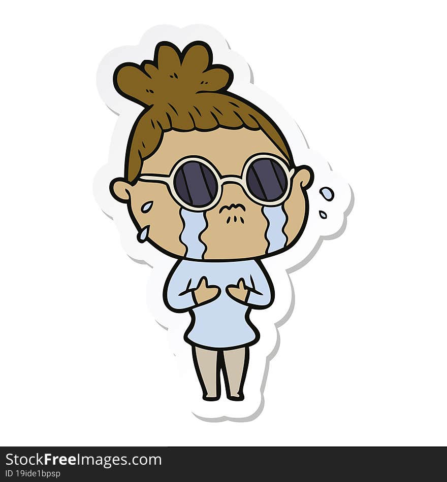 sticker of a cartoon crying woman wearing dark glasses