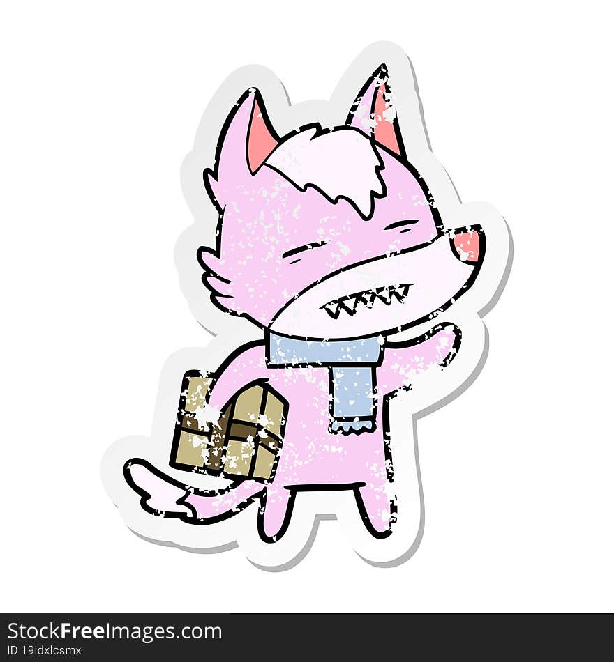 distressed sticker of a cartoon wolf with a gift