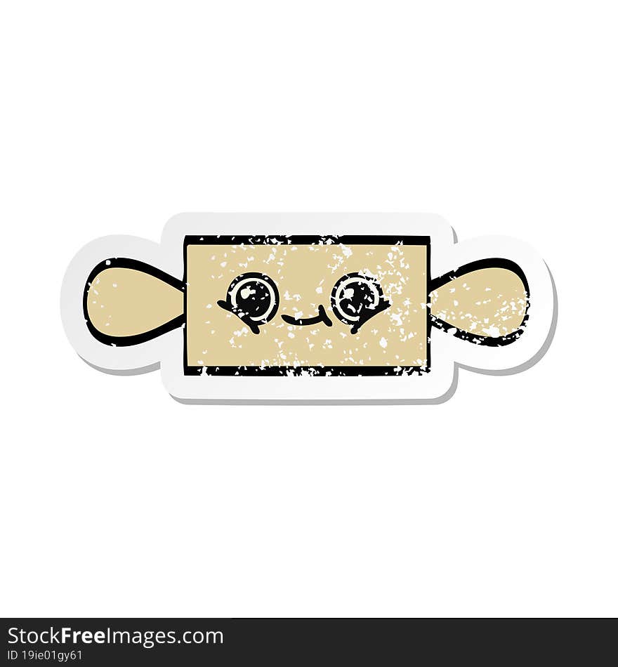 distressed sticker of a cute cartoon rolling pin