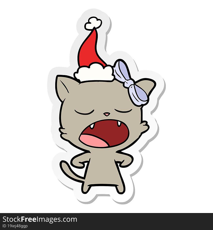 sticker cartoon of a yawning cat wearing santa hat