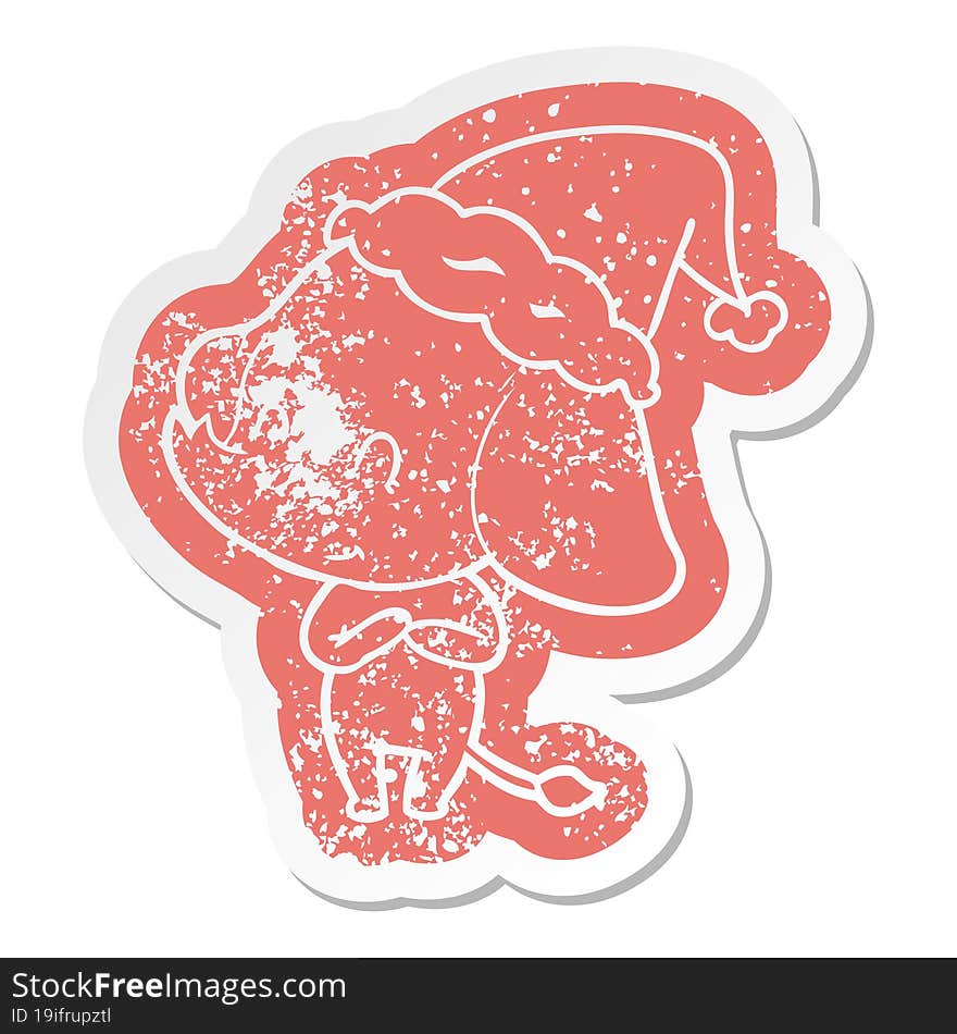 cute cartoon distressed sticker of a elephant wearing santa hat