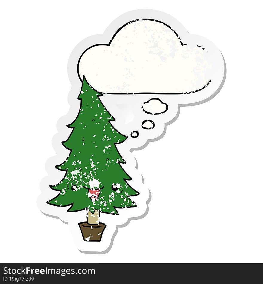 cute cartoon christmas tree and thought bubble as a distressed worn sticker