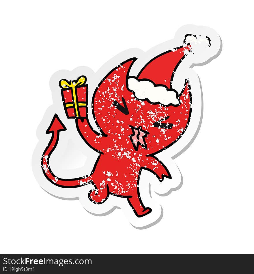 christmas distressed sticker cartoon of kawaii devil