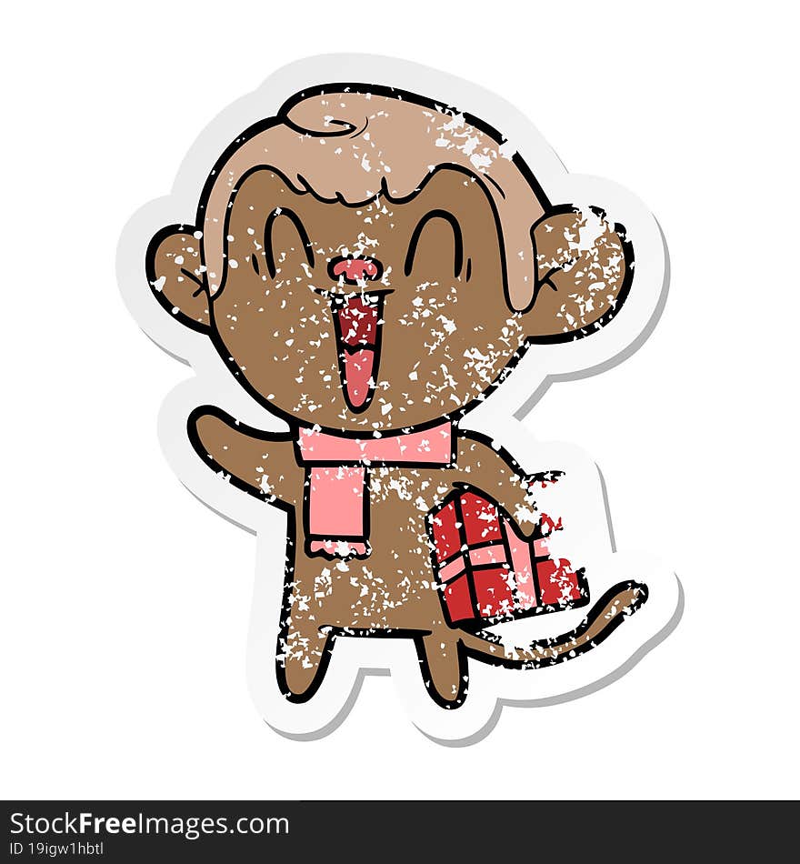 distressed sticker of a cartoon laughing monkey