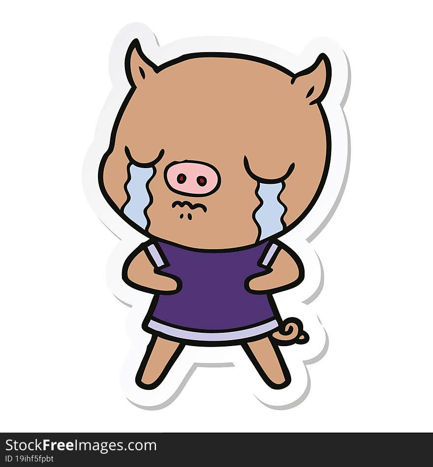 sticker of a cartoon pig crying