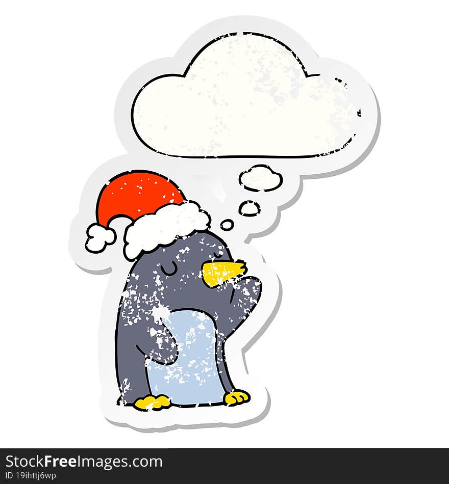 Cute Cartoon Christmas Penguin And Thought Bubble As A Distressed Worn Sticker