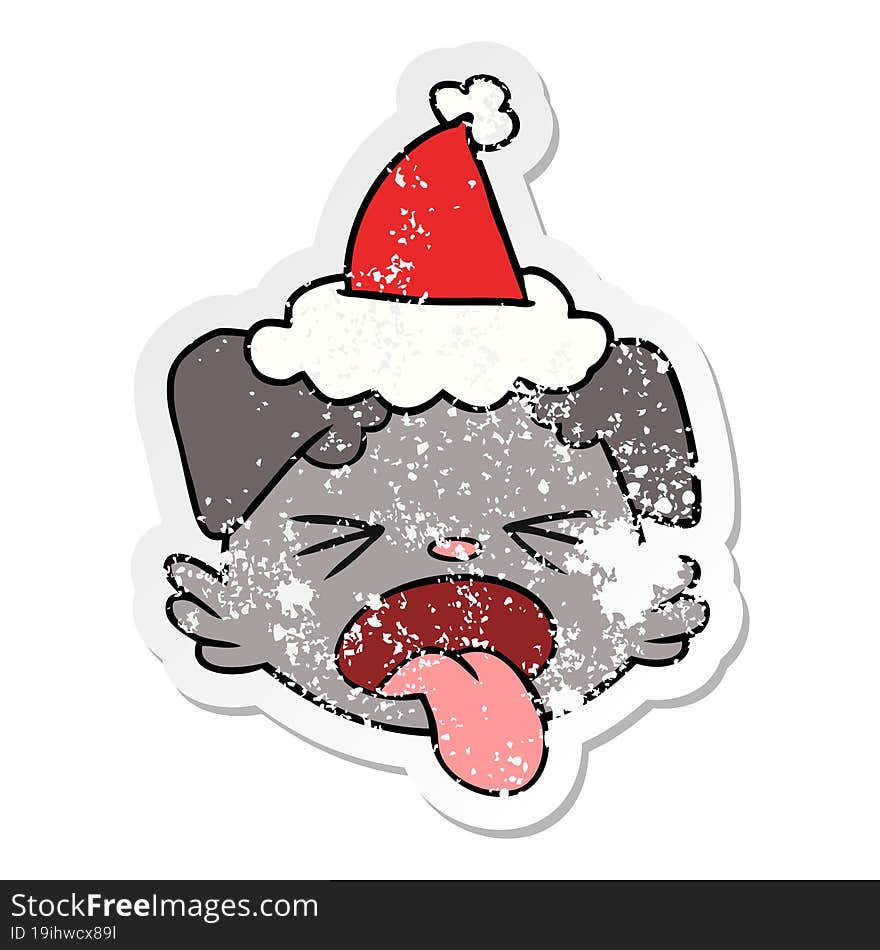 hand drawn distressed sticker cartoon of a dog face wearing santa hat