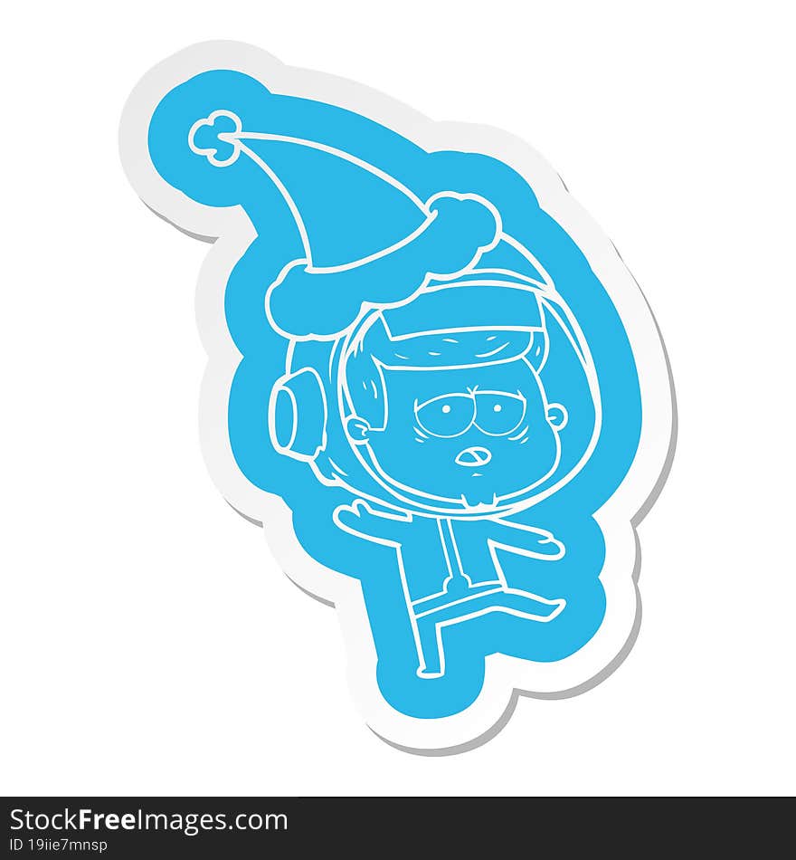 Cartoon  Sticker Of A Tired Astronaut Wearing Santa Hat